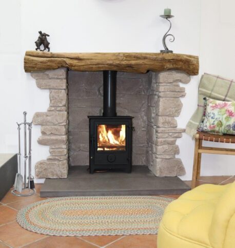 Dartmoor 5 Se 5 kW Woodburning Stove with honed black granite hearth.